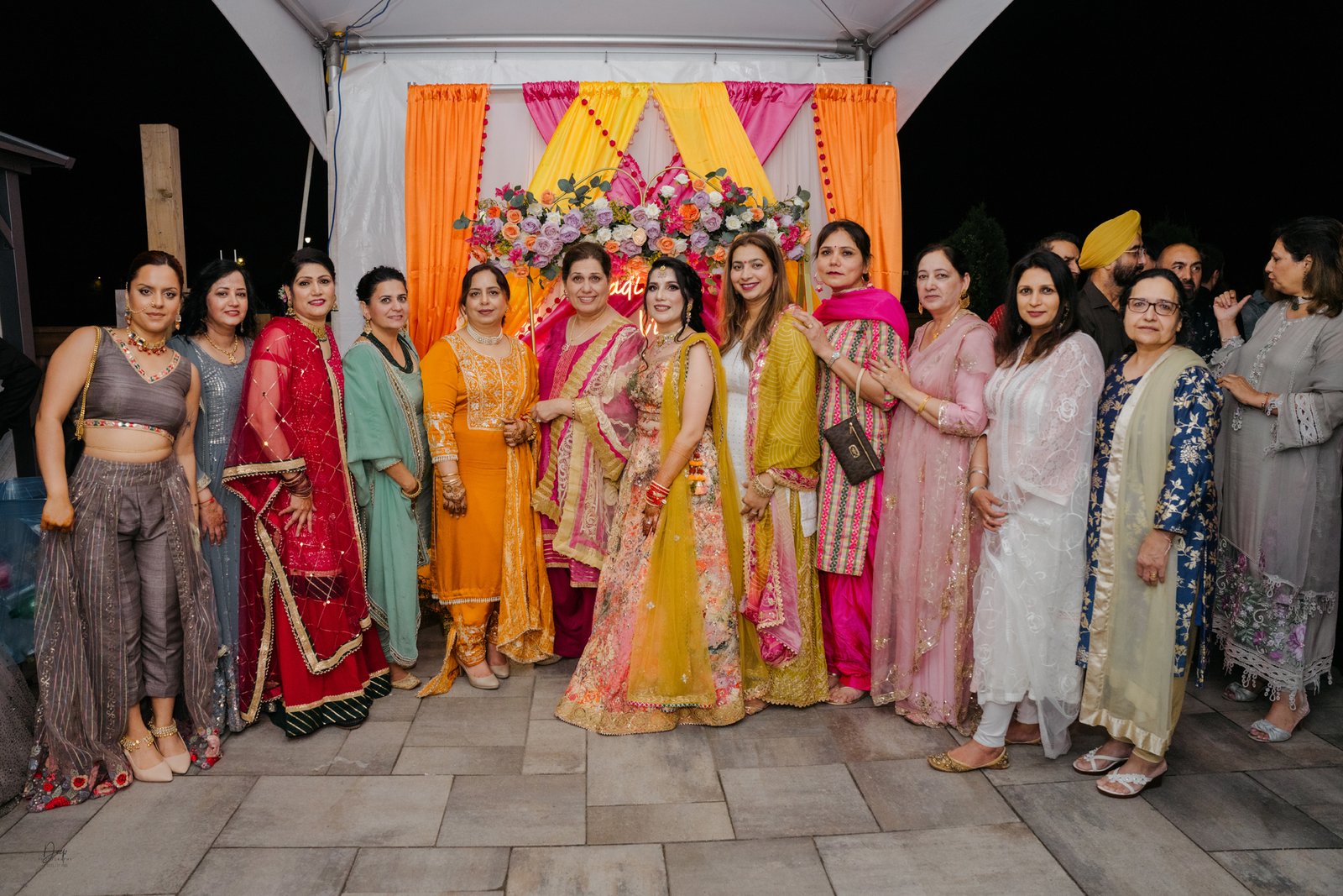 Bride getting her Mehndi applied during pre-wedding celebration