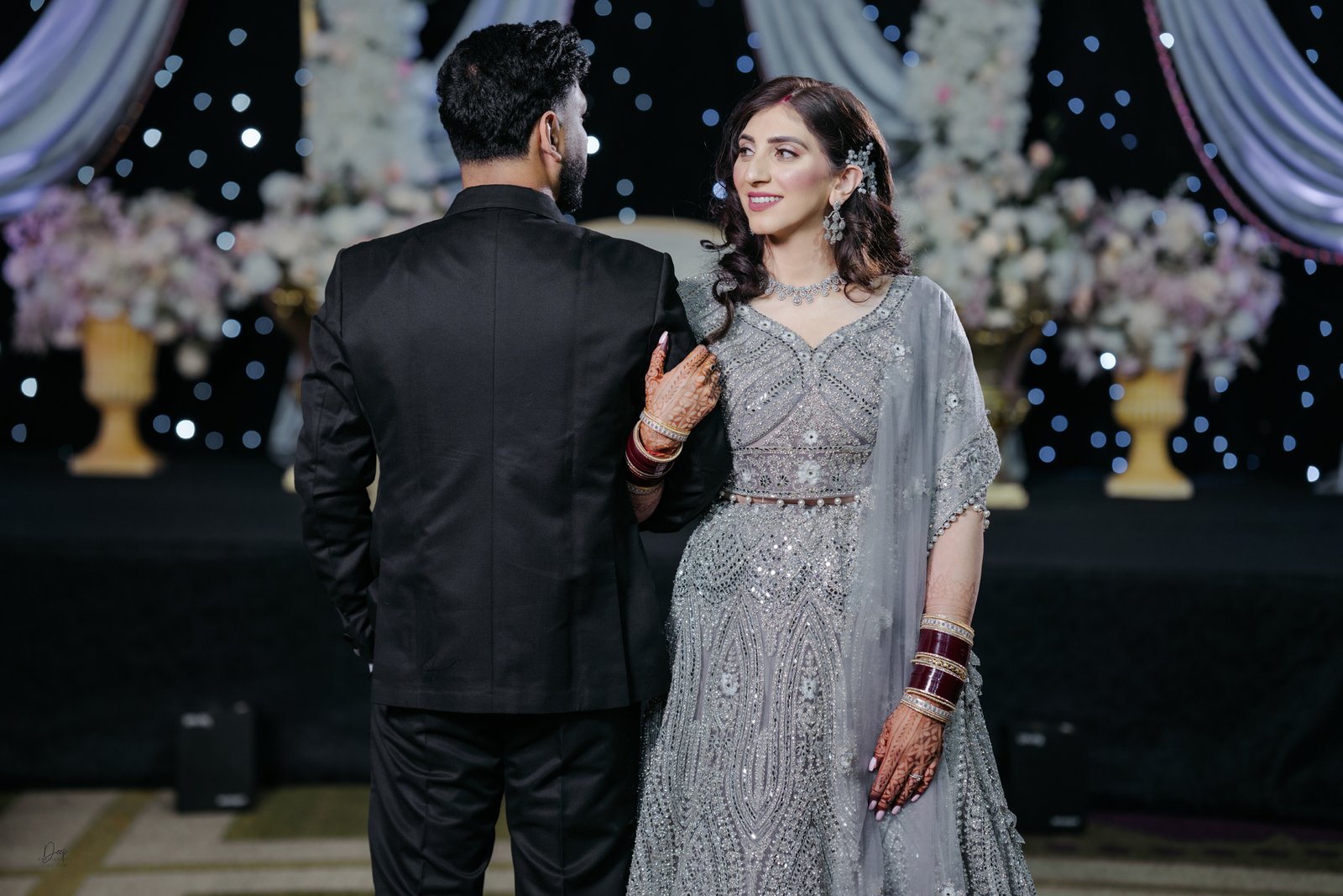Romantic moment between bride and groom on the dance floor