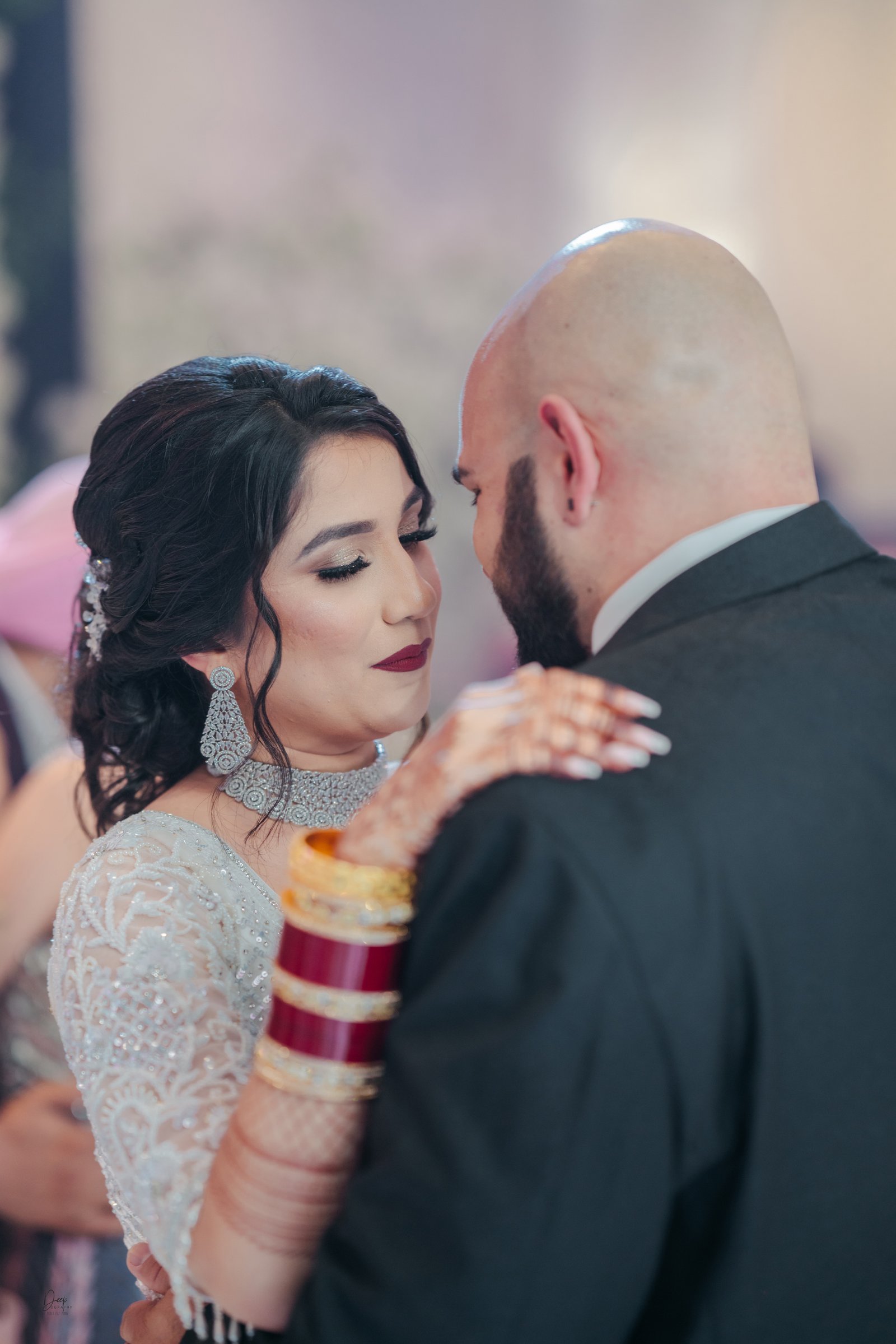 Bride and groom celebrating love with their first dance