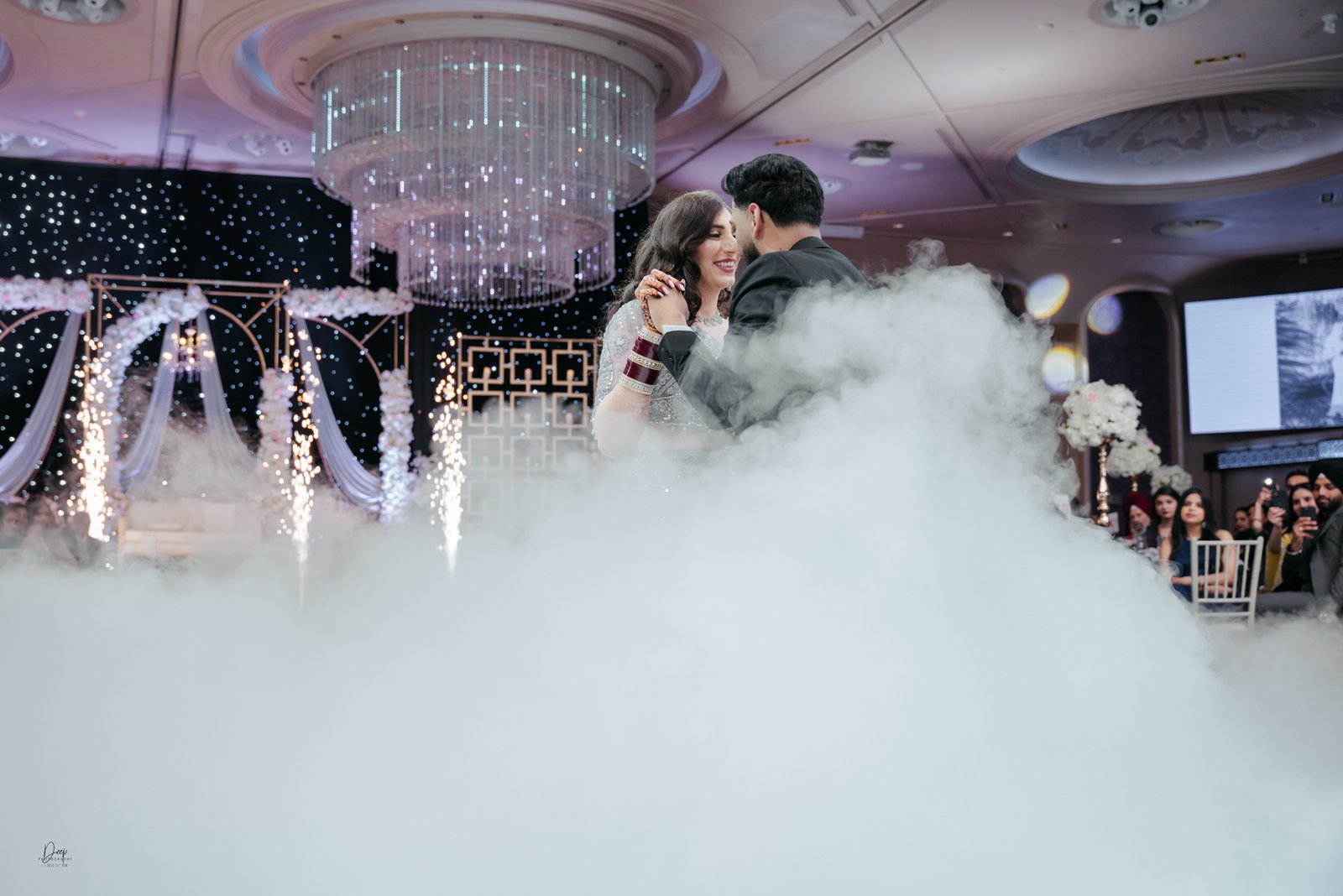 Bride and groom dancing at wedding reception