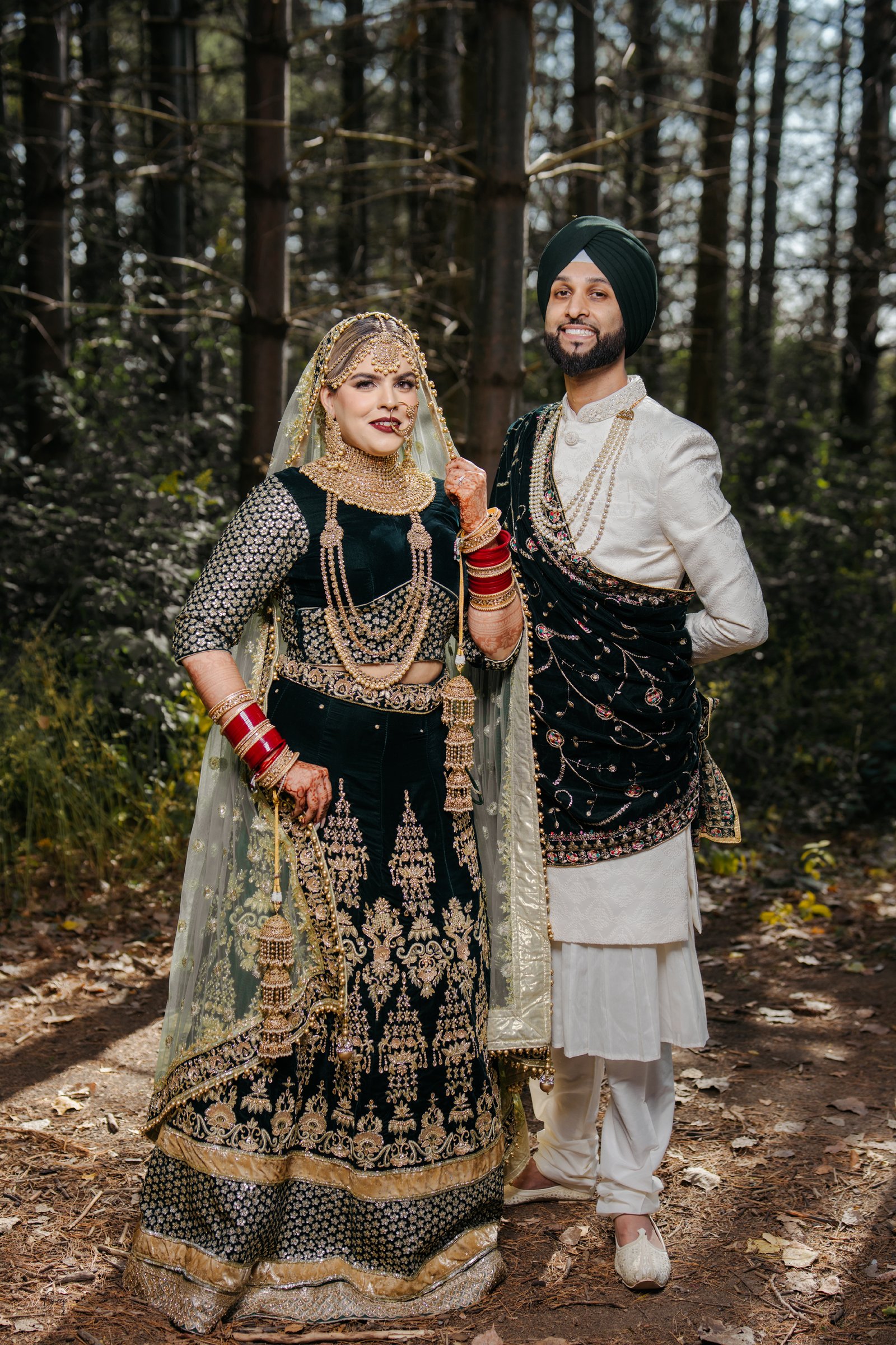 Stylish couple pose in wedding attire