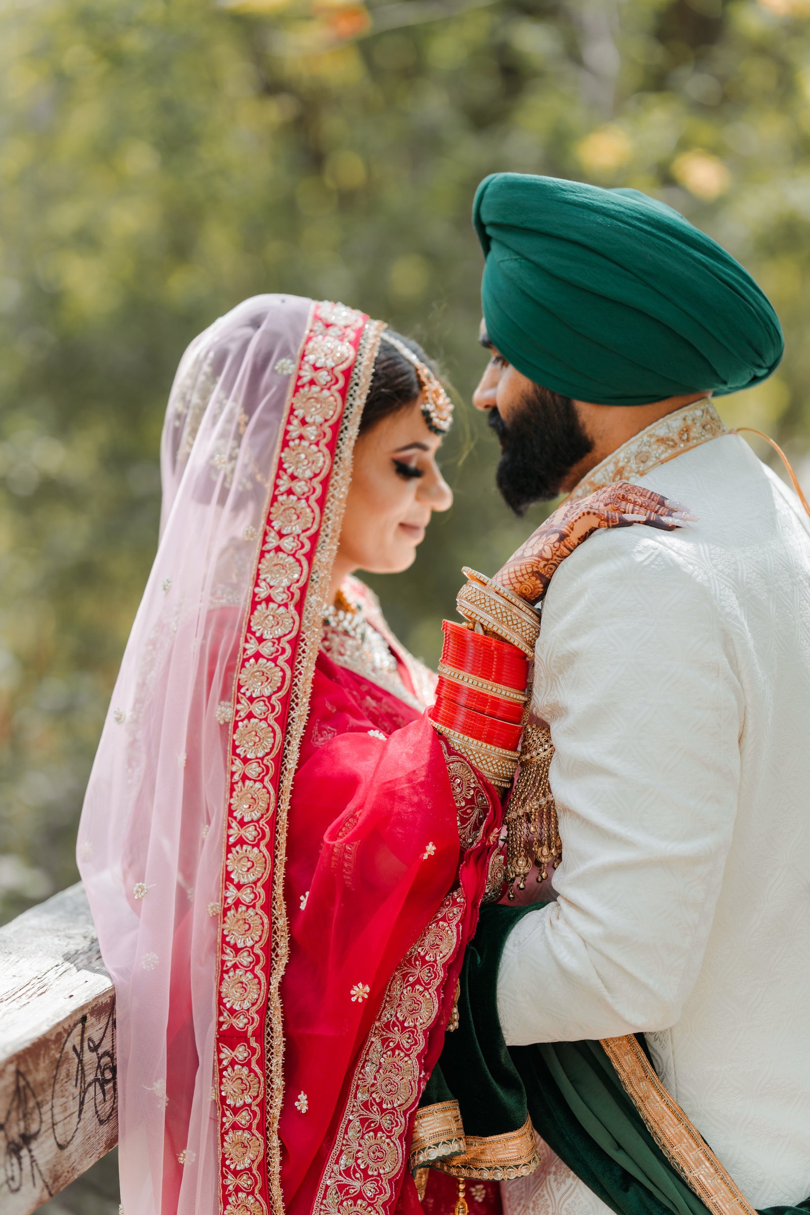 Bride resting on groom’s shoulder during shoot (Bikram And Pawan)